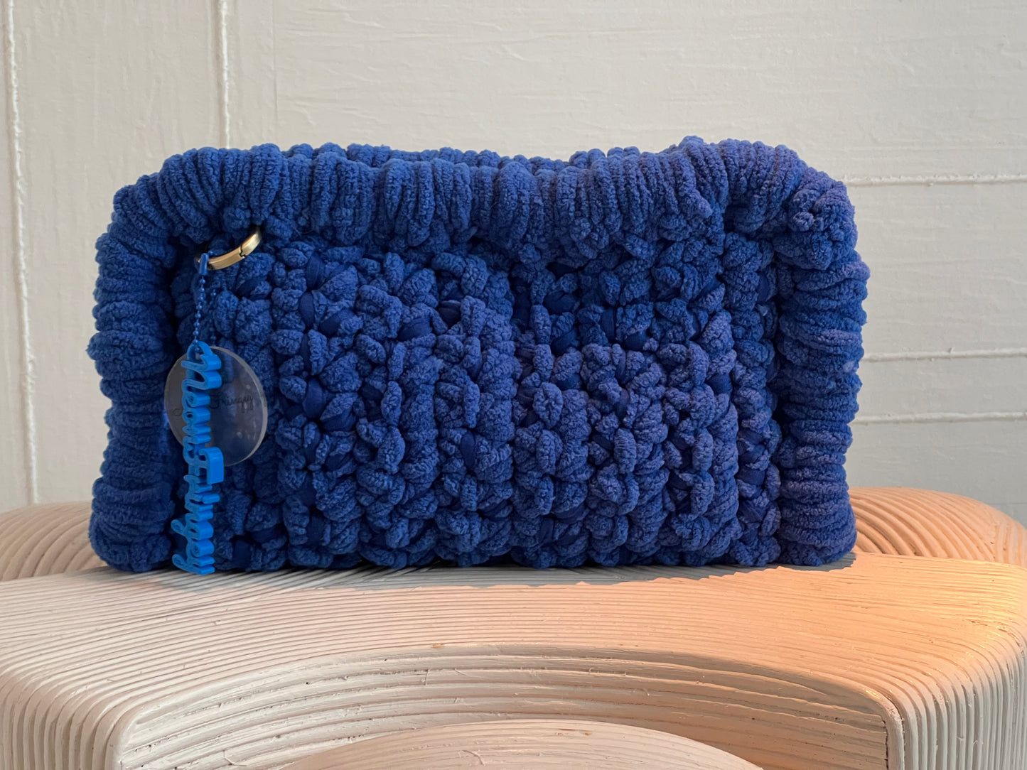 BLUE BORDER CLUTCH