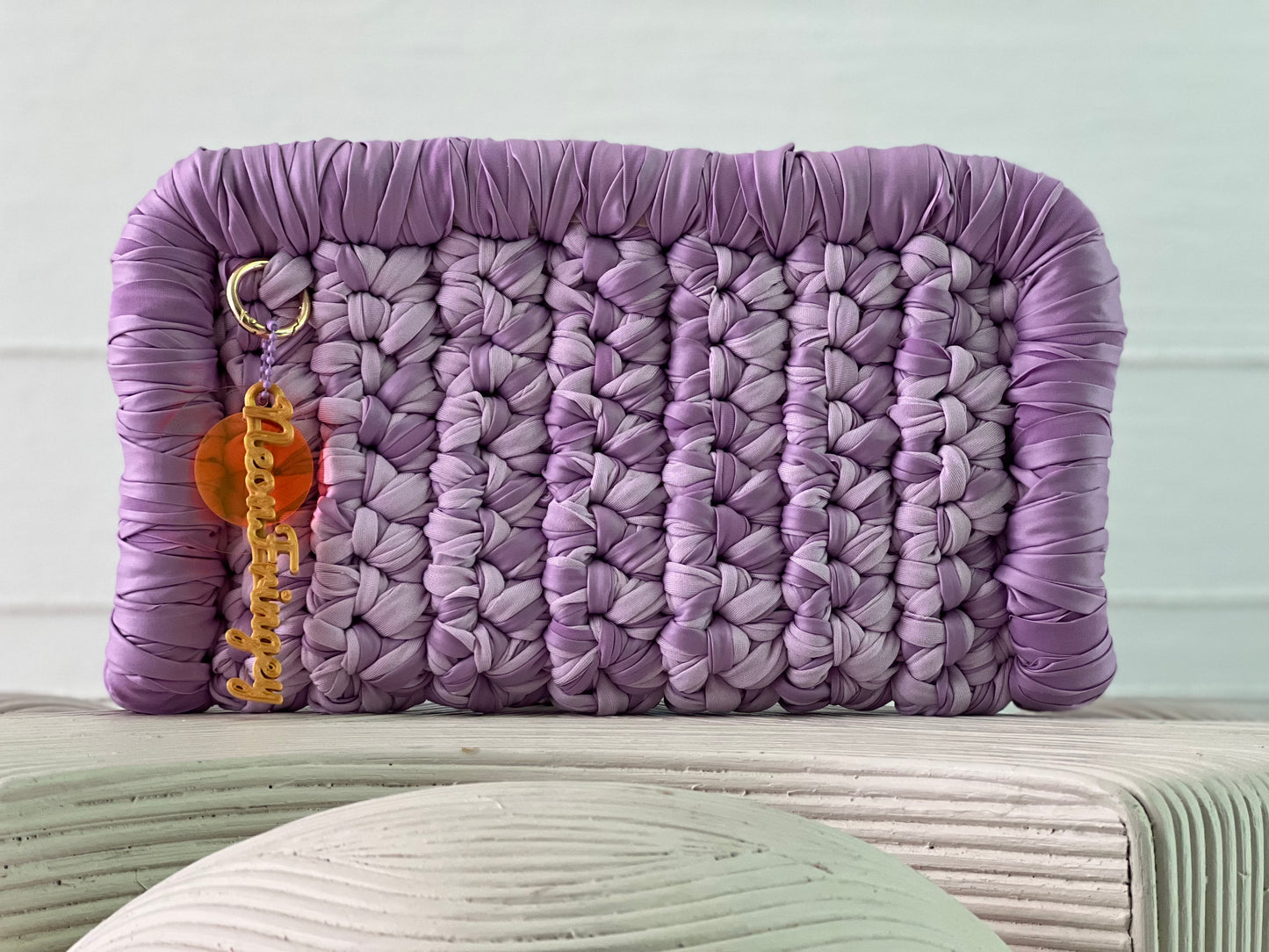 LAVENDER BORDER CLUTCH